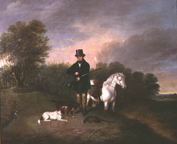 Sportsman with dogs and game